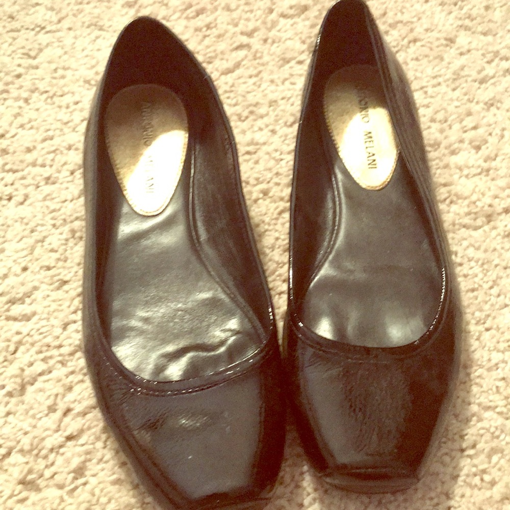 A pair of black flats